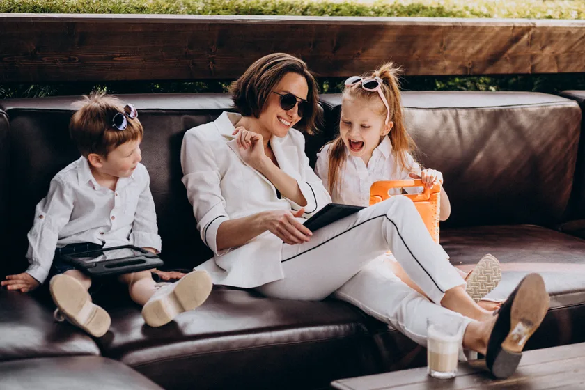 A mother reading with her children