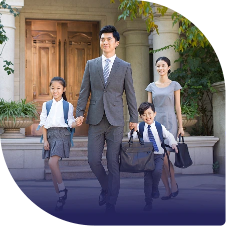 A family walking their children to school in Malaysia